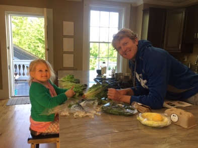 Elinor helping to cook a healthy dinner.